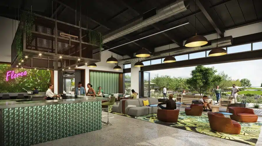 Modern café interior with people sitting and ordering coffee, large windows, greenery, a neon sign reading “Floreo,” and outdoor seating visible through open walls.